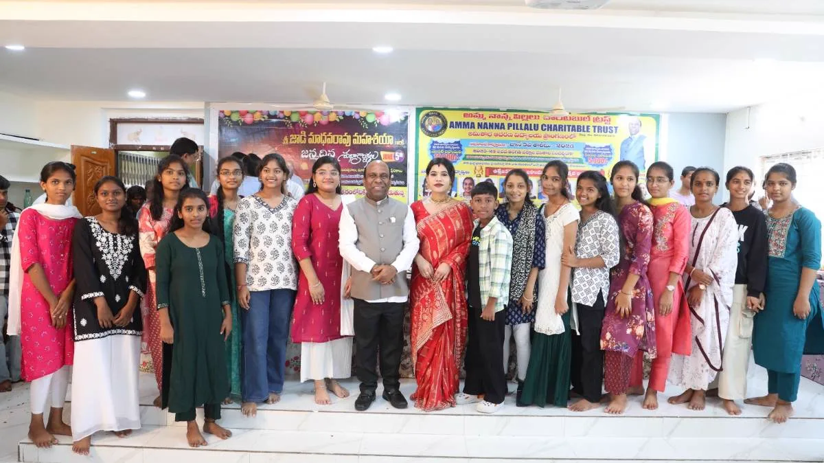 Aadarana children with founder Sri Jadi Madhava Rao and guests at a campus celebration