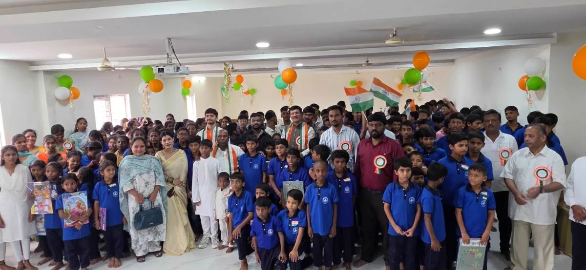 Children, staff and guests gathered in the assembly hall on Independence Day