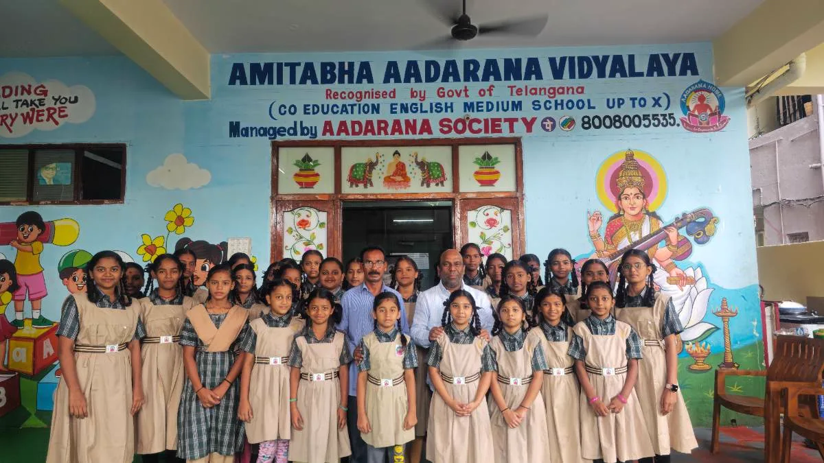 Students and teachers in front of Amitabha Aadarana Vidyalaya